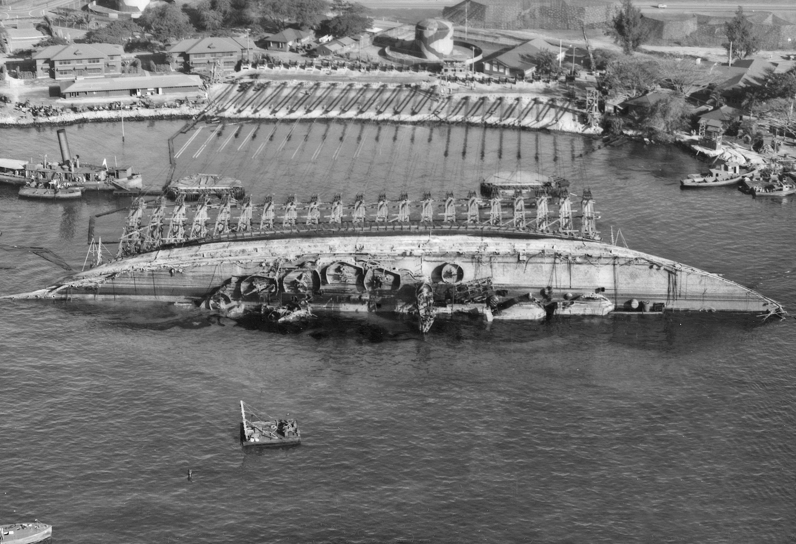 The Navy attempts to right USS Oklahoma on March 19, 1943. National Archives photo.